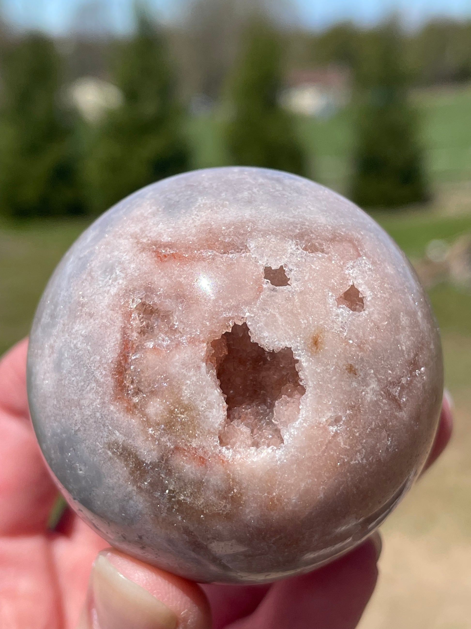 Pink Amethyst Sphere: Radiant crystal ball with delicate pink tones