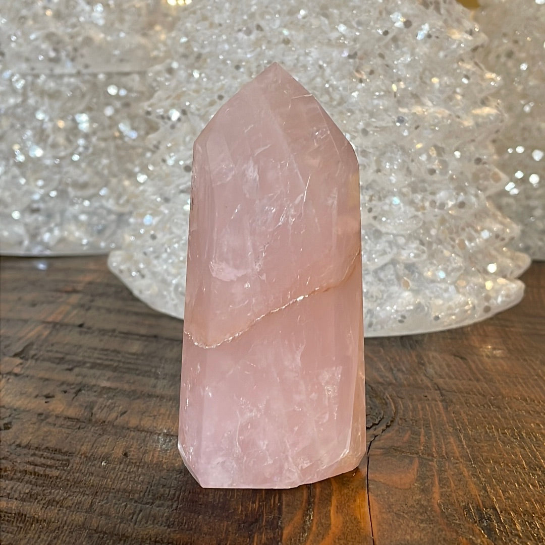 Elegant Rose Quartz tower, featuring soft pink tones and a graceful crystal formation for a serene and enchanting aesthetic