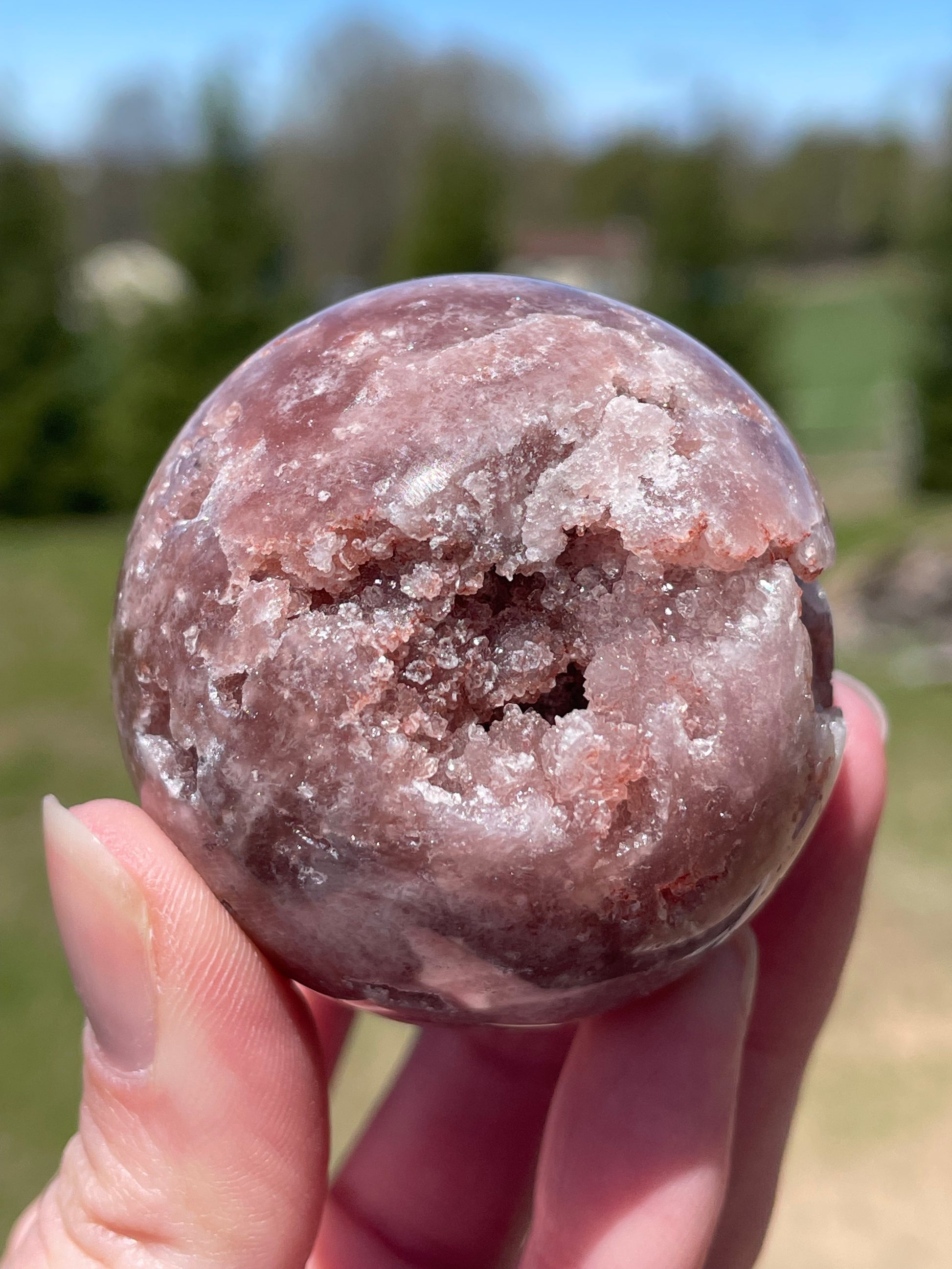 Pink Amethyst Sphere: Radiant crystal ball with delicate pink tones