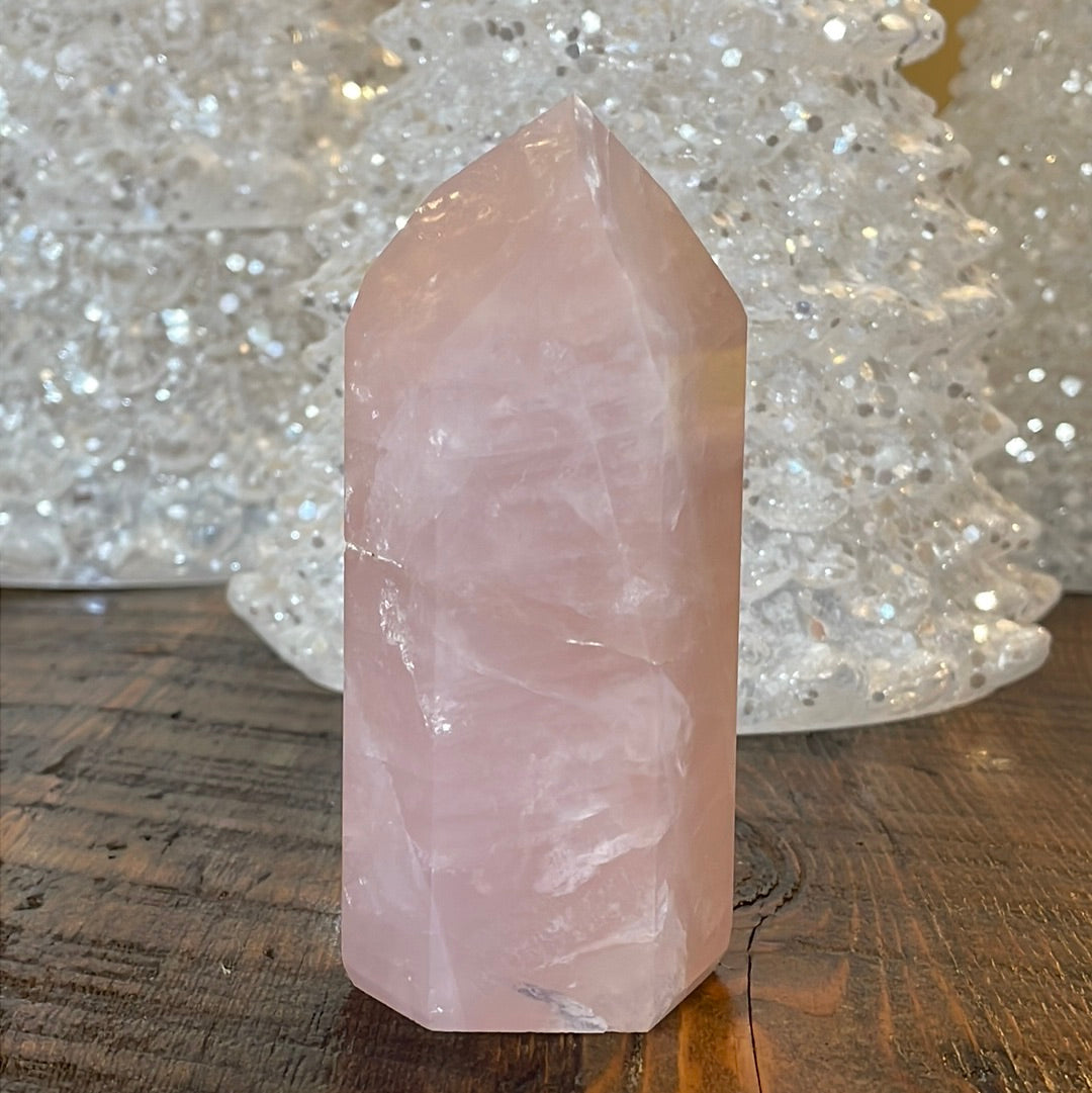Elegant Rose Quartz tower, featuring soft pink tones and a graceful crystal formation for a serene and enchanting aesthetic