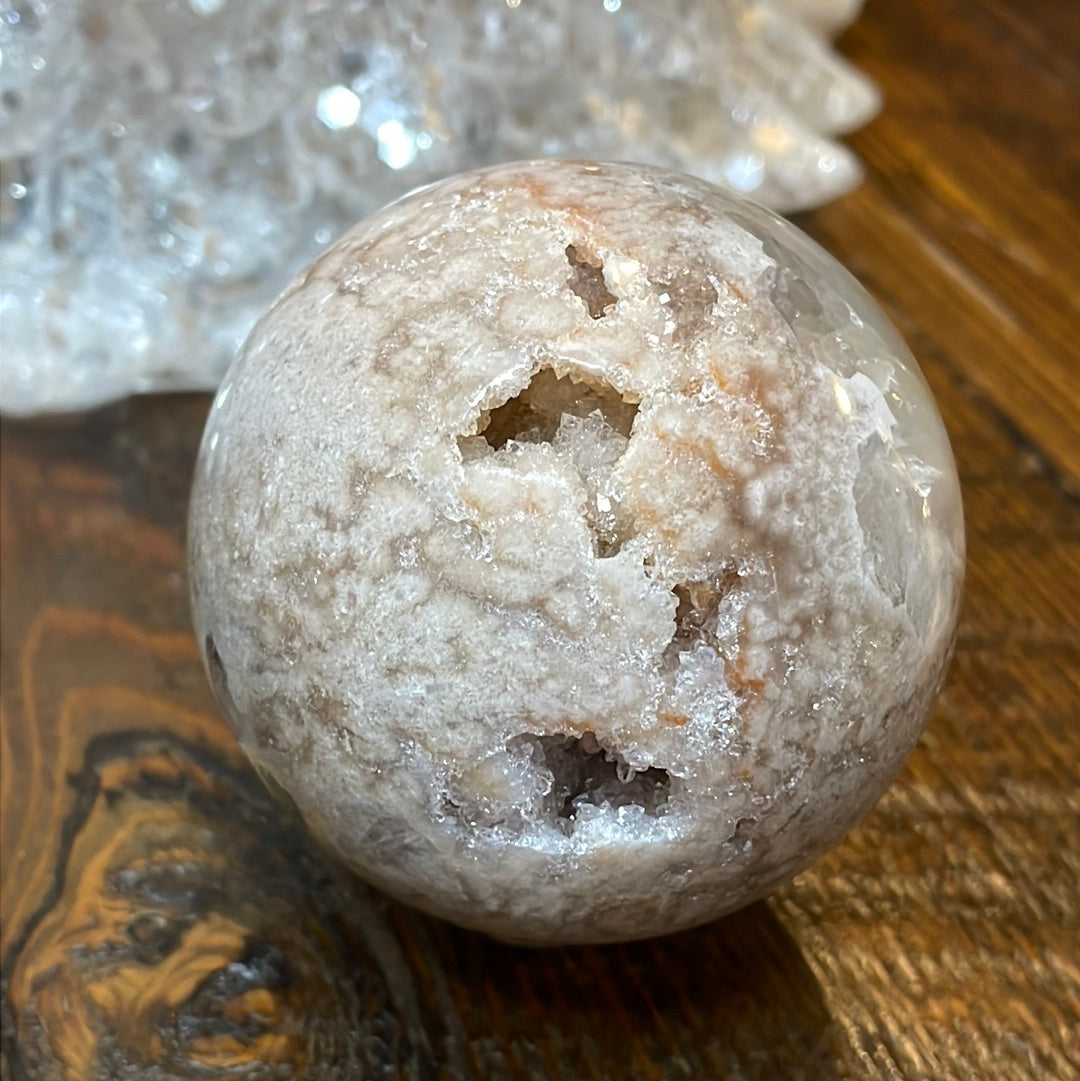 Pink Amethyst Druzy Sphere, a radiant and enchanting crystal ball showcasing delicate crystalline formations in soothing pink tones.