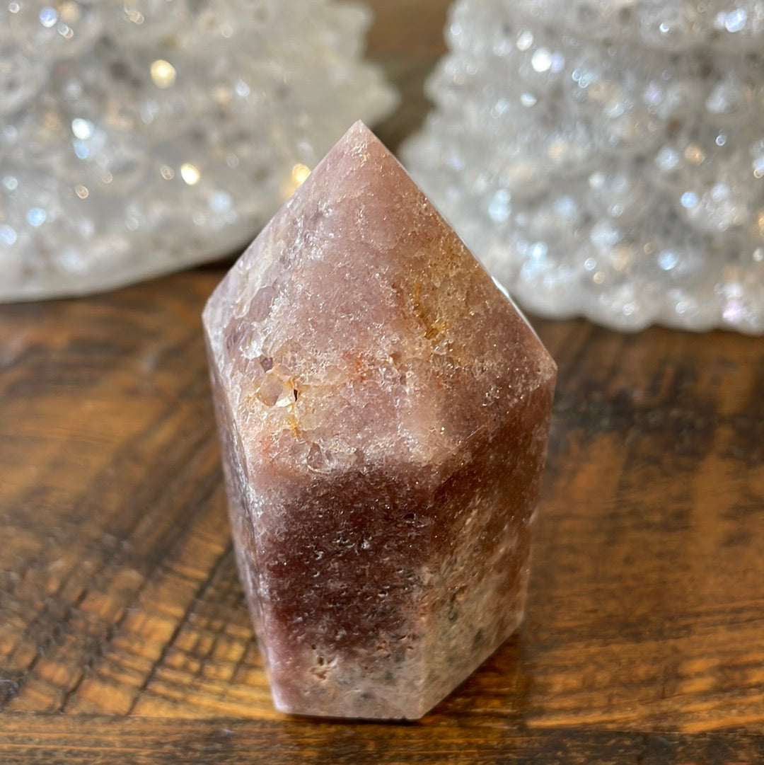 Pink Amethyst druzy tower, showcasing delicate crystalline formations in a soothing hue for a truly enchanting natural beauty.