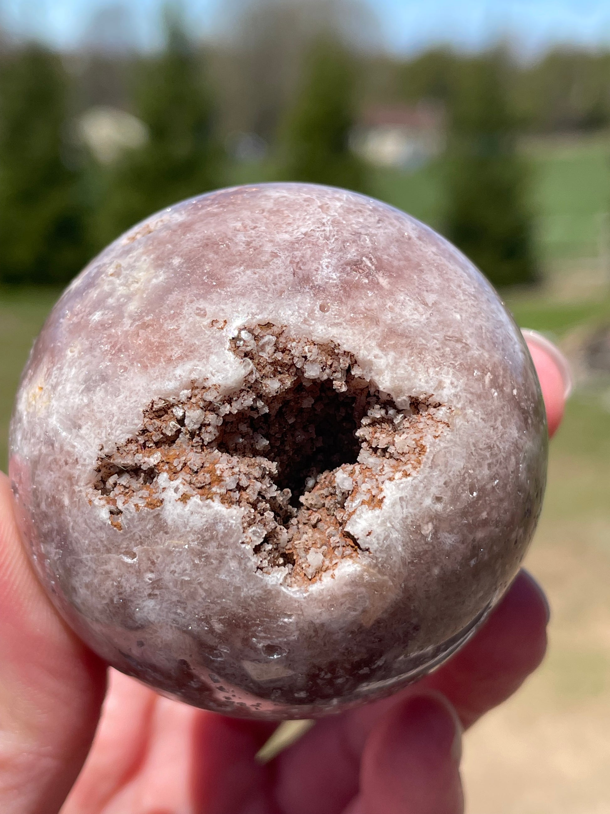 Pink Amethyst Sphere: Radiant crystal ball with delicate pink tones