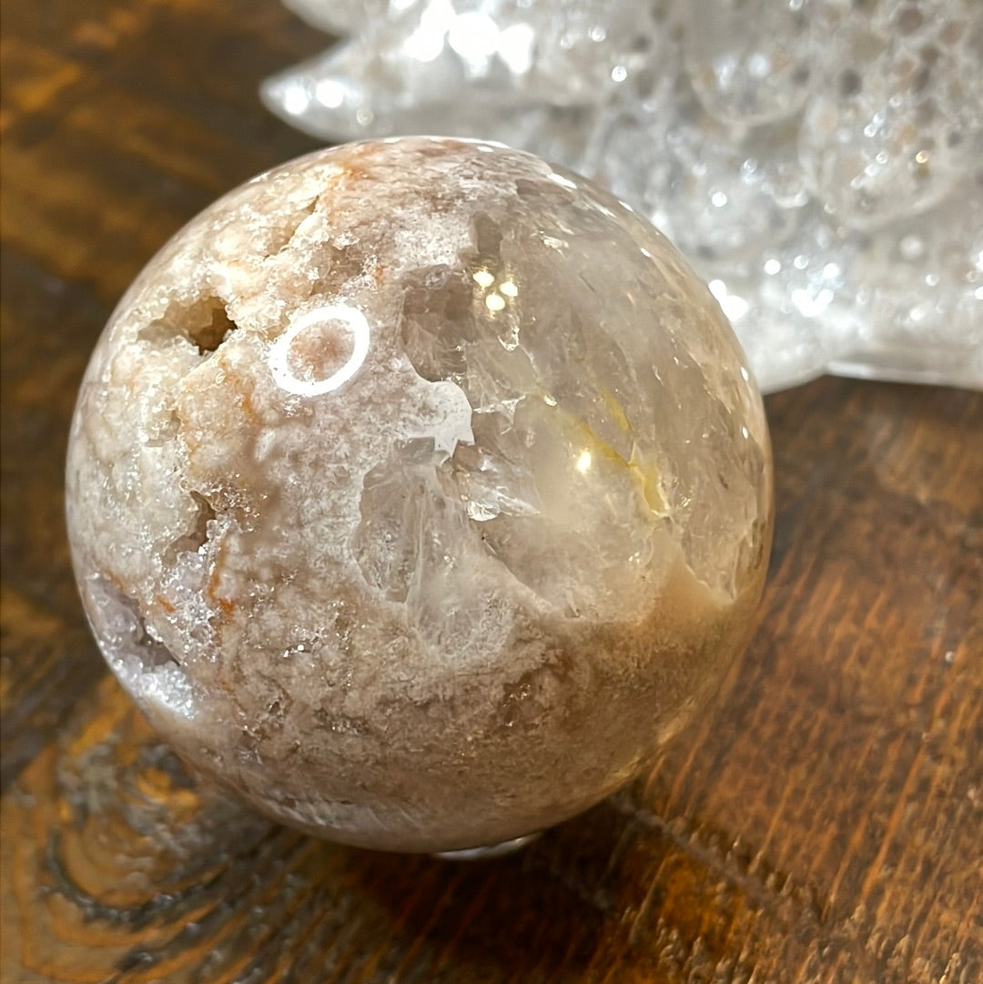 Pink Amethyst Druzy Sphere, a radiant and enchanting crystal ball showcasing delicate crystalline formations in soothing pink tones.