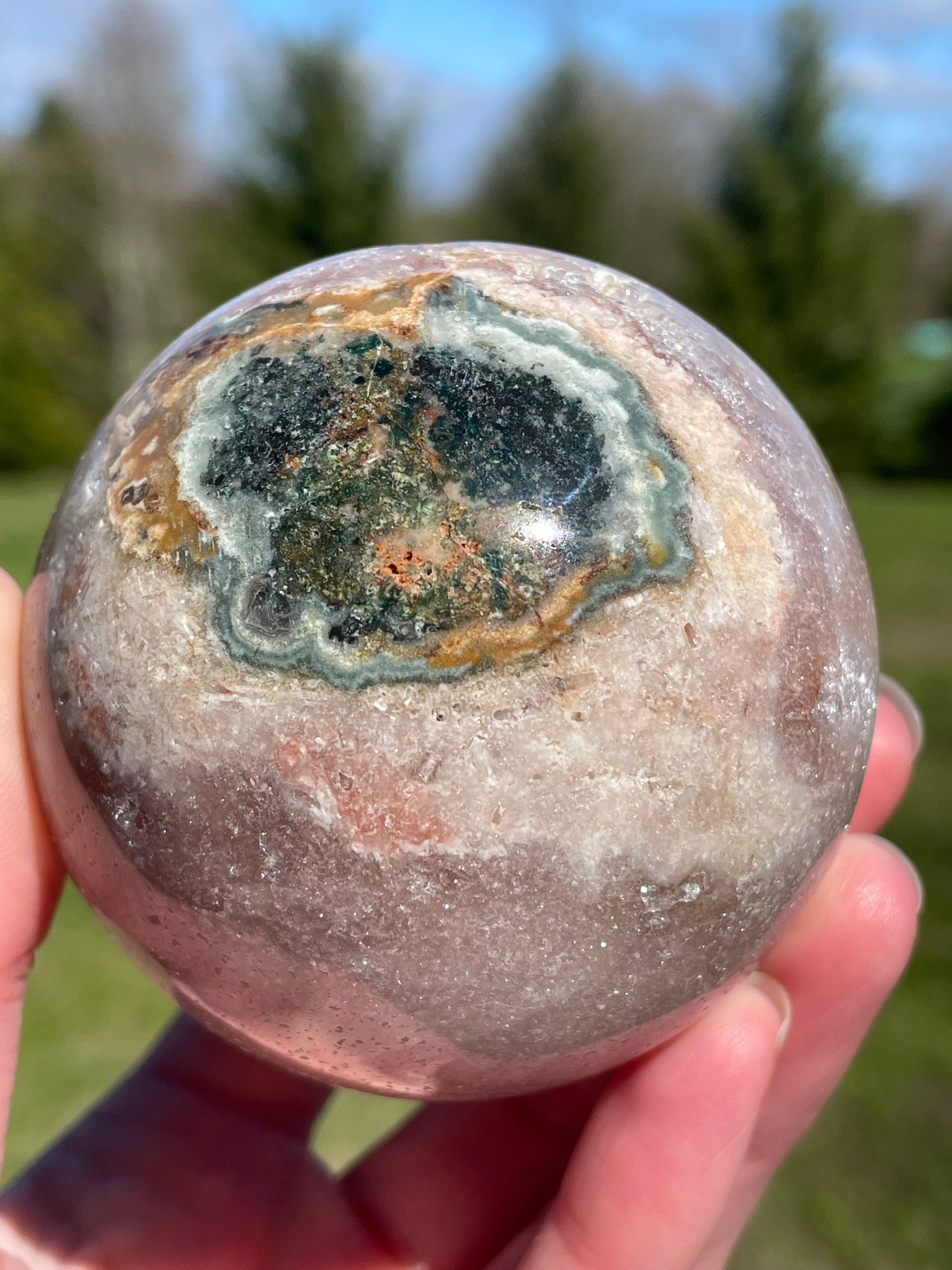 Pink Amethyst Sphere: Radiant crystal ball with delicate pink tones