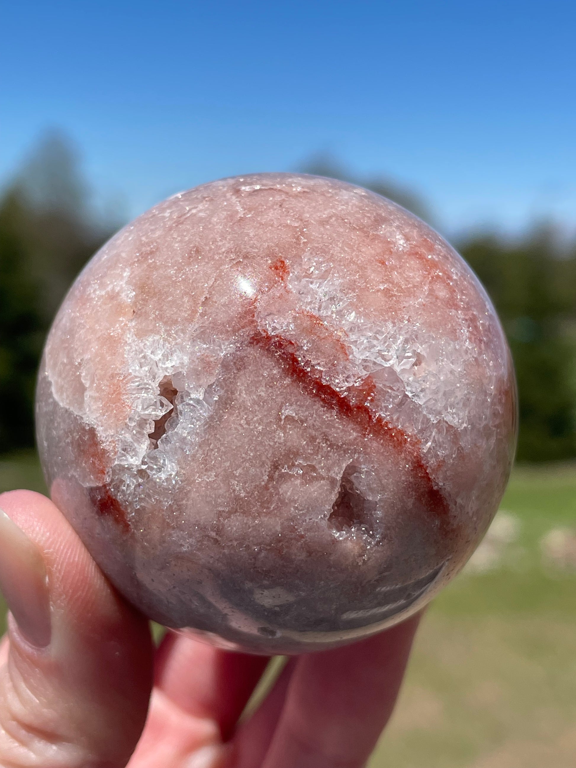 Pink Amethyst Sphere: Radiant crystal ball with delicate pink tones