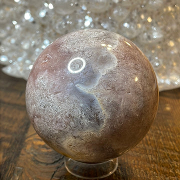 Pink Amethyst Druzy Sphere, a radiant and enchanting crystal ball showcasing delicate crystalline formations in soothing pink tones.