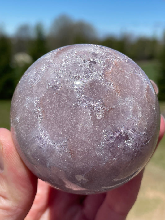 Pink Amethyst Sphere: Radiant crystal ball with delicate pink tones