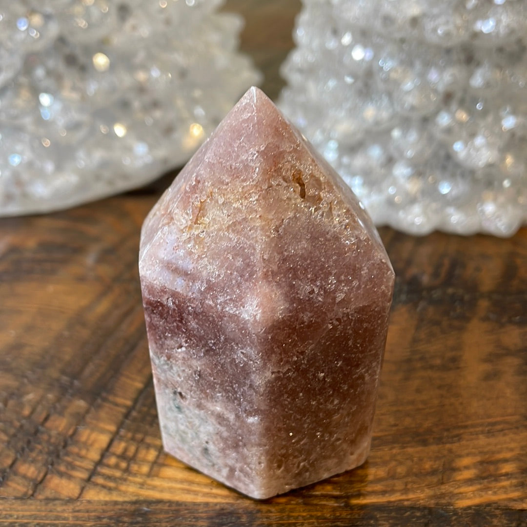 Pink Amethyst druzy tower, showcasing delicate crystalline formations in a soothing hue for a truly enchanting natural beauty.