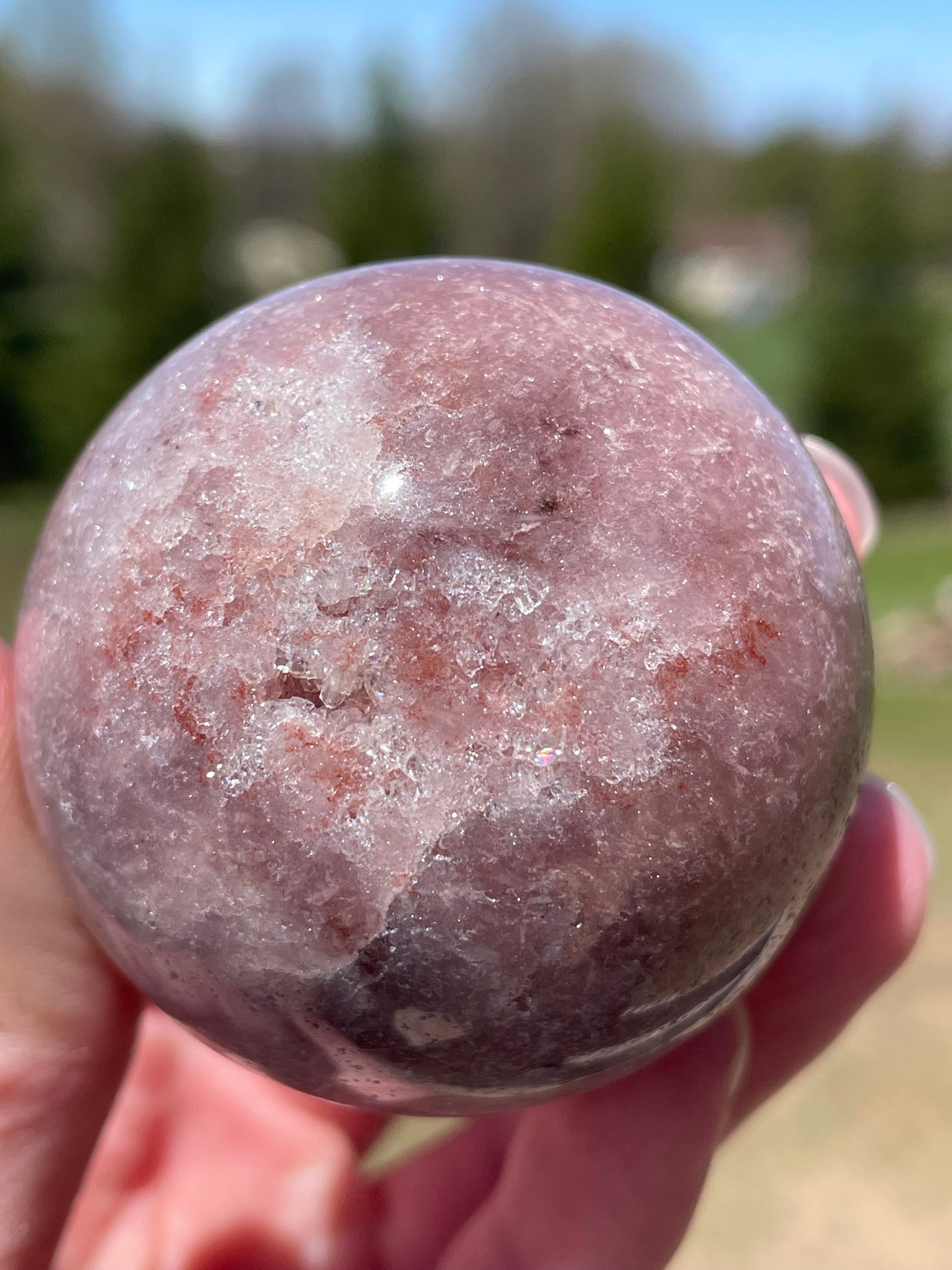 Pink Amethyst Sphere: Radiant crystal ball with delicate pink tones
