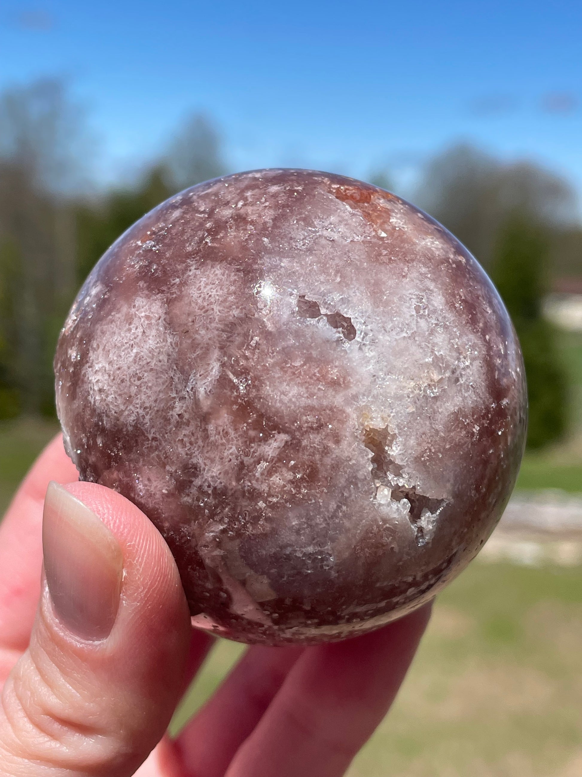 Pink Amethyst Sphere: Radiant crystal ball with delicate pink tones
