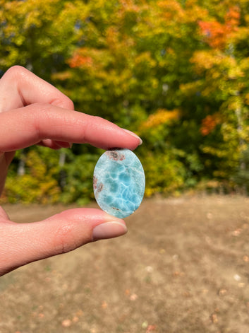 Super blue with soft white lines, oval in shape with polished surface. It has effects on four of the seven Chakras