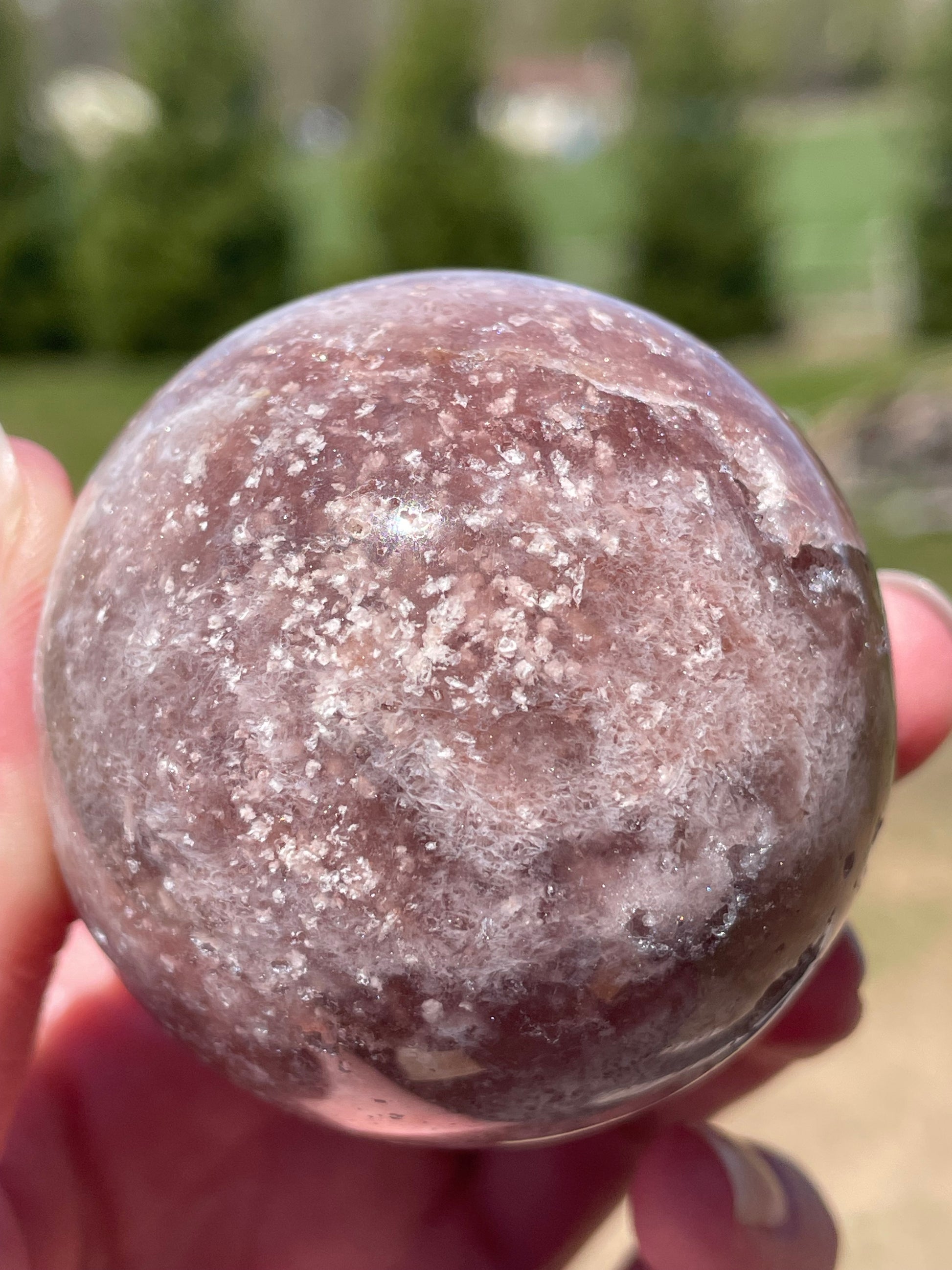 Pink Amethyst Sphere: Radiant crystal ball with delicate pink tones