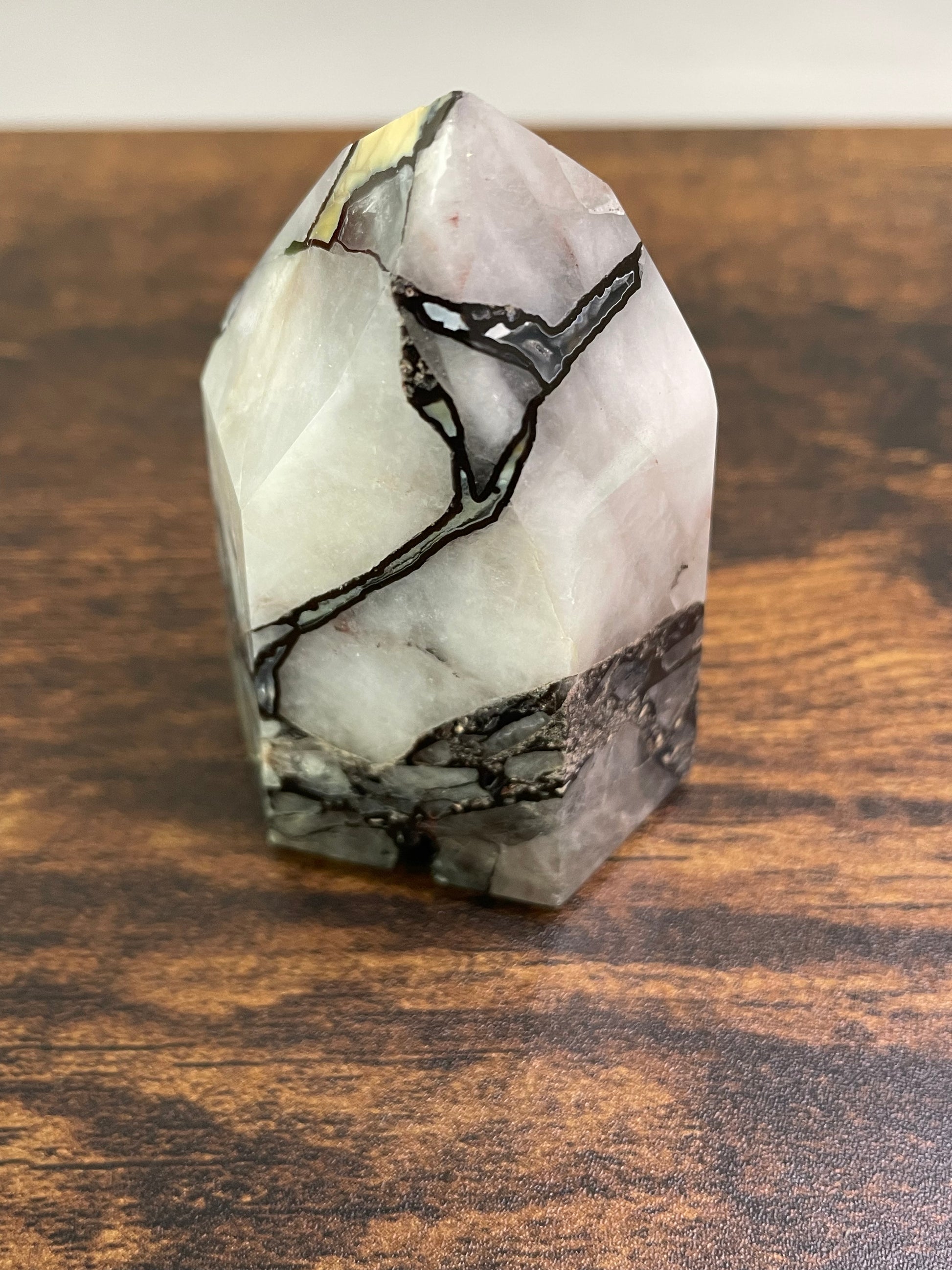 Mosaic Quartz, a captivating arrangement of Quartz crystals forming a mosaic-like pattern, showcasing the intricate beauty of nature's geological artistry in various shades and textures.