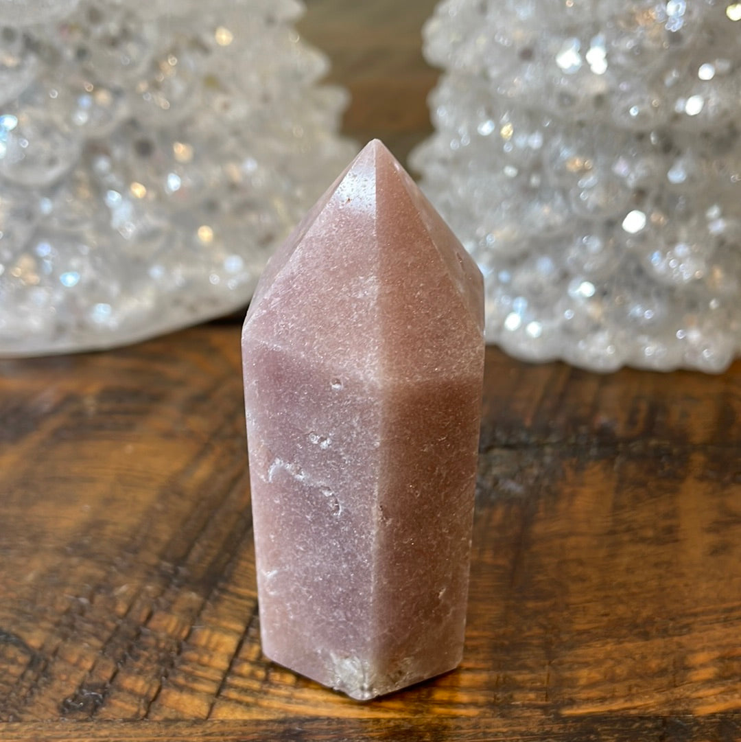 Pink Amethyst druzy tower, showcasing delicate crystalline formations in a soothing hue for a truly enchanting natural beauty.