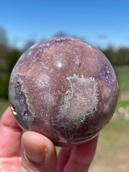 Pink Amethyst Sphere: Radiant crystal ball with delicate pink tones