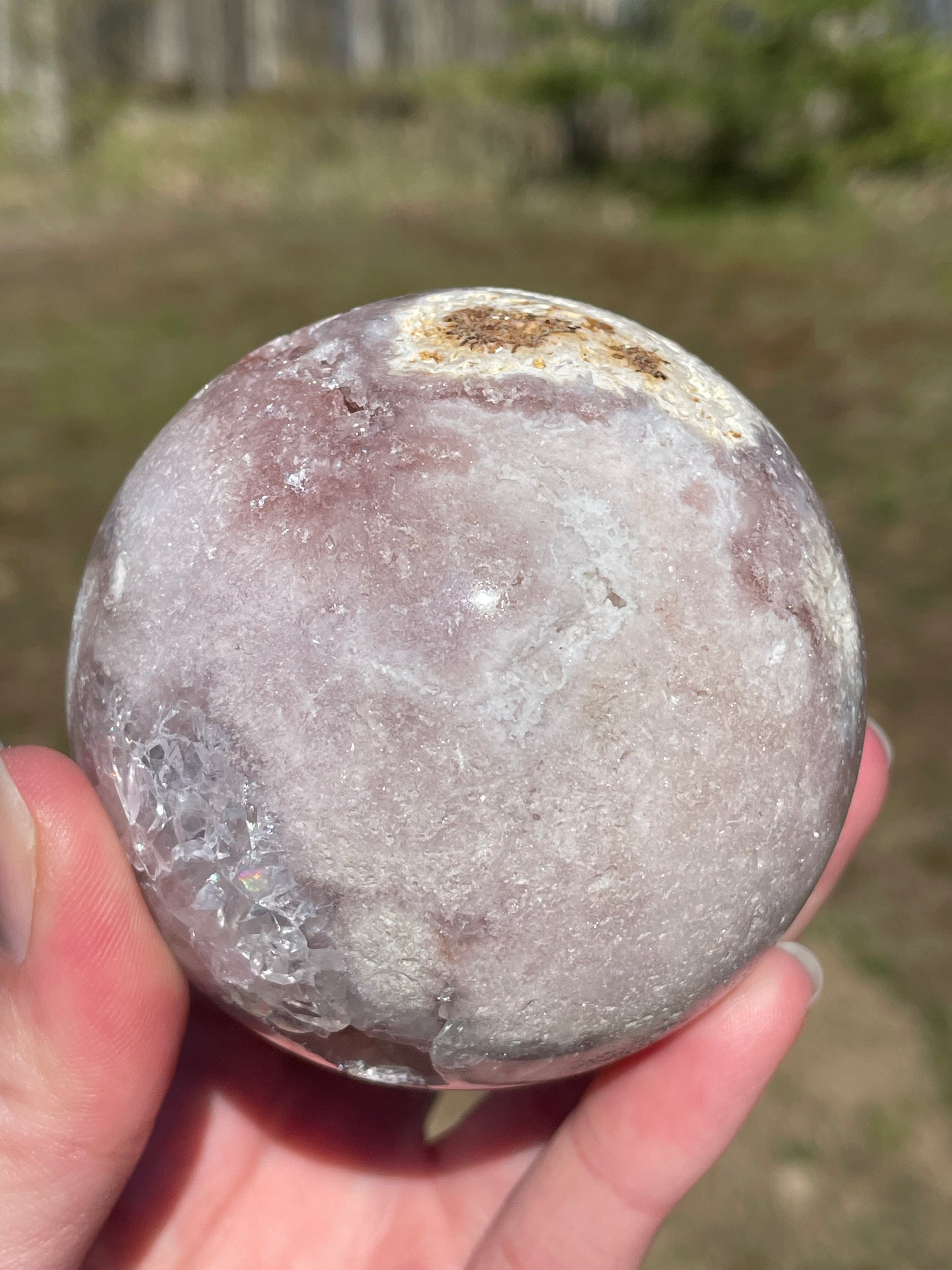 Pink Amethyst Sphere: Radiant crystal ball with delicate pink tones