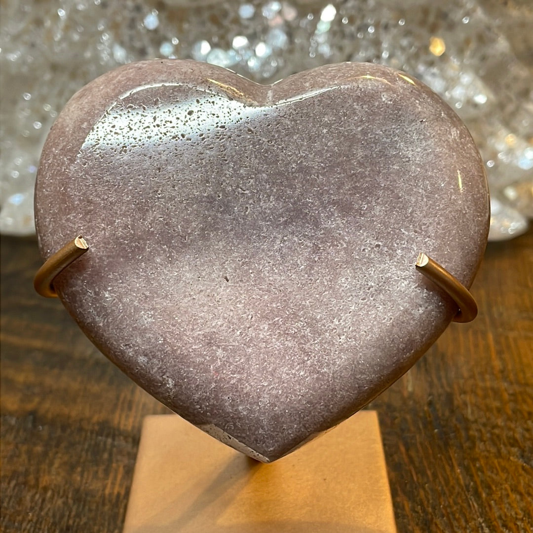 Pink Amethyst druzy hearts elagantly presented on custom metal stands, blending romance and sophistication in a crystalline showcase.