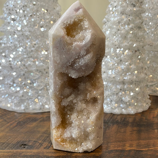 Pink Amethyst druzy tower, showcasing delicate crystalline formations in a soothing hue for a truly enchanting natural beauty.