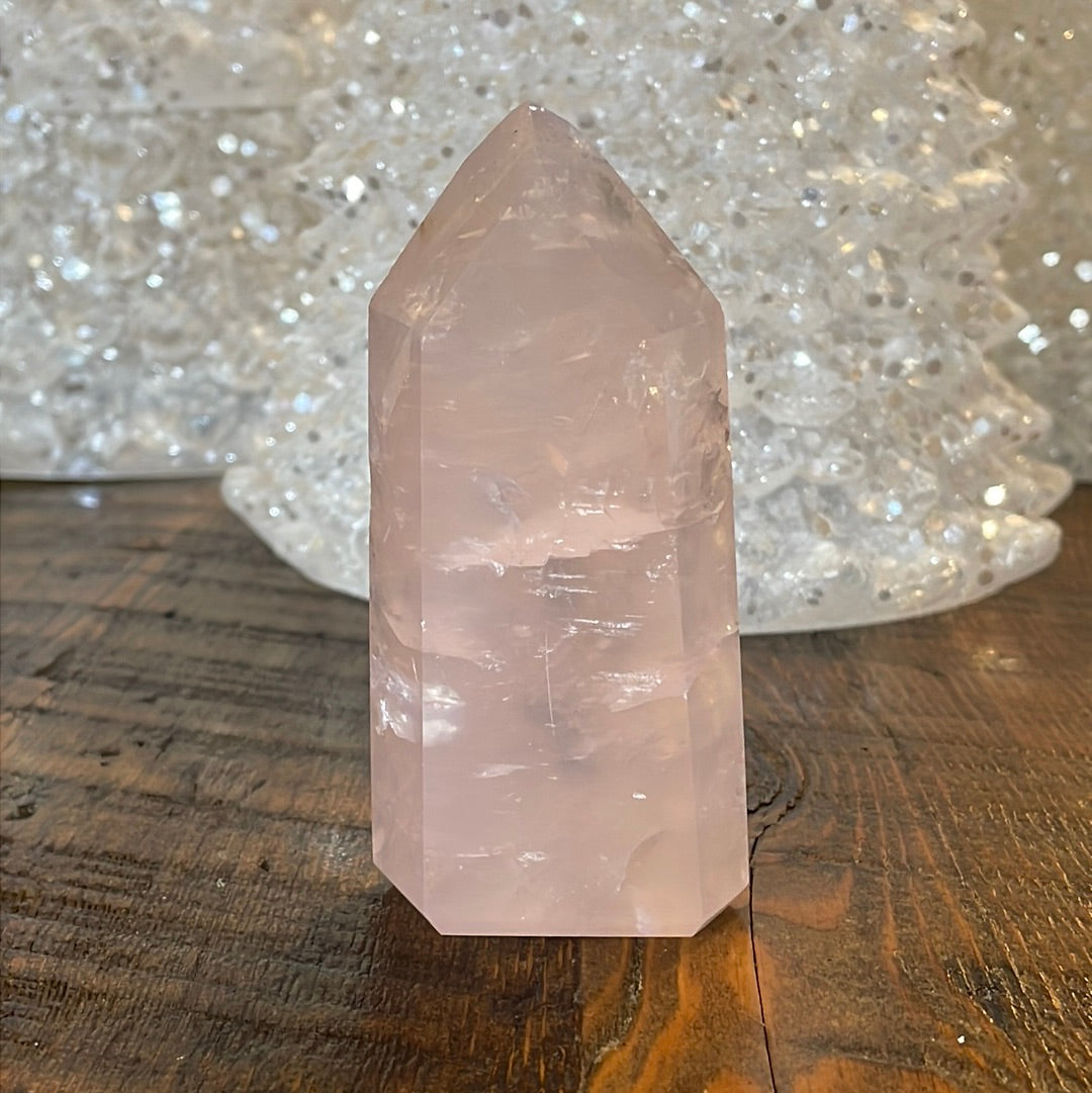 Elegant Rose Quartz tower, featuring soft pink tones and a graceful crystal formation for a serene and enchanting aesthetic