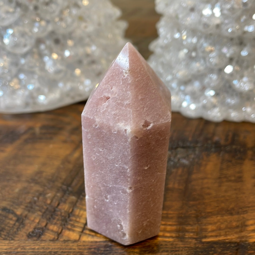 Pink Amethyst druzy tower, showcasing delicate crystalline formations in a soothing hue for a truly enchanting natural beauty.