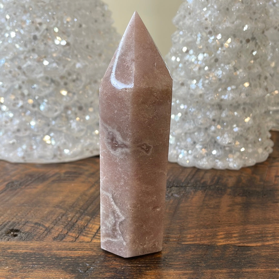 Pink Amethyst druzy tower, showcasing delicate crystalline formations in a soothing hue for a truly enchanting natural beauty.