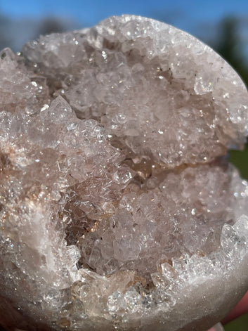 Pink Amethyst Sphere: Radiant crystal ball with delicate pink tones