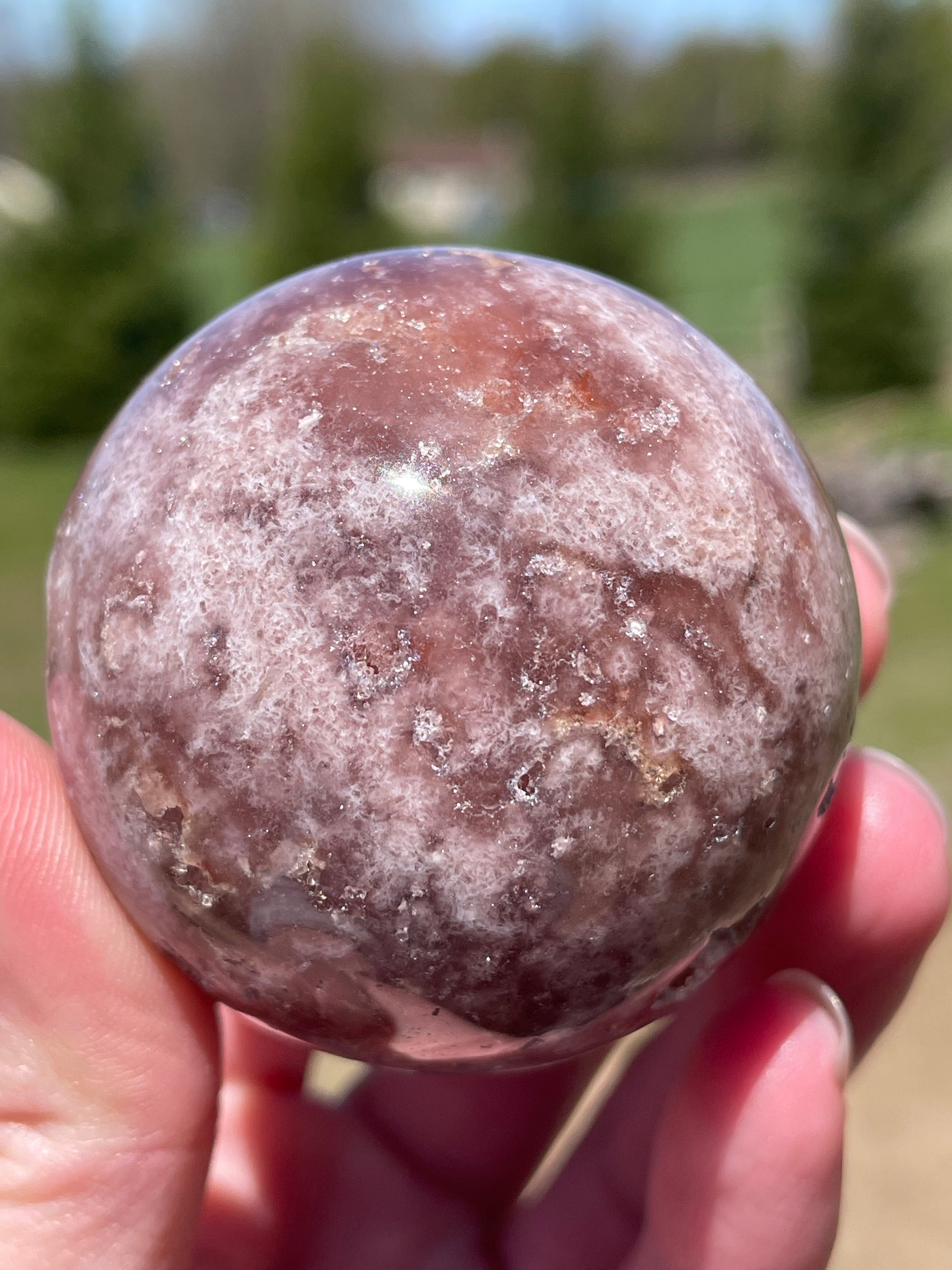 Pink Amethyst Sphere: Radiant crystal ball with delicate pink tones