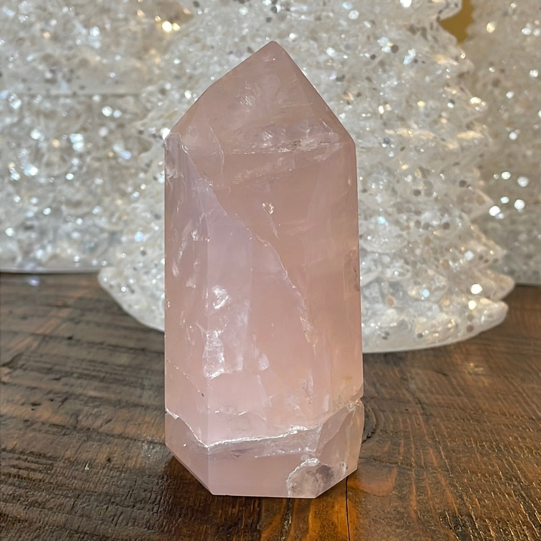 Elegant Rose Quartz tower, featuring soft pink tones and a graceful crystal formation for a serene and enchanting aesthetic