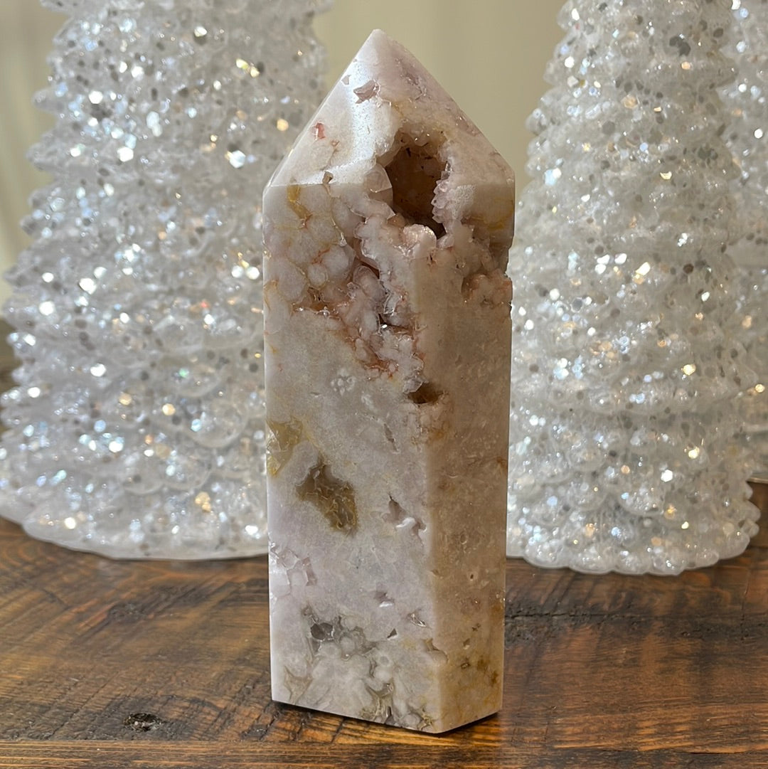 Pink Amethyst druzy tower, showcasing delicate crystalline formations in a soothing hue for a truly enchanting natural beauty.