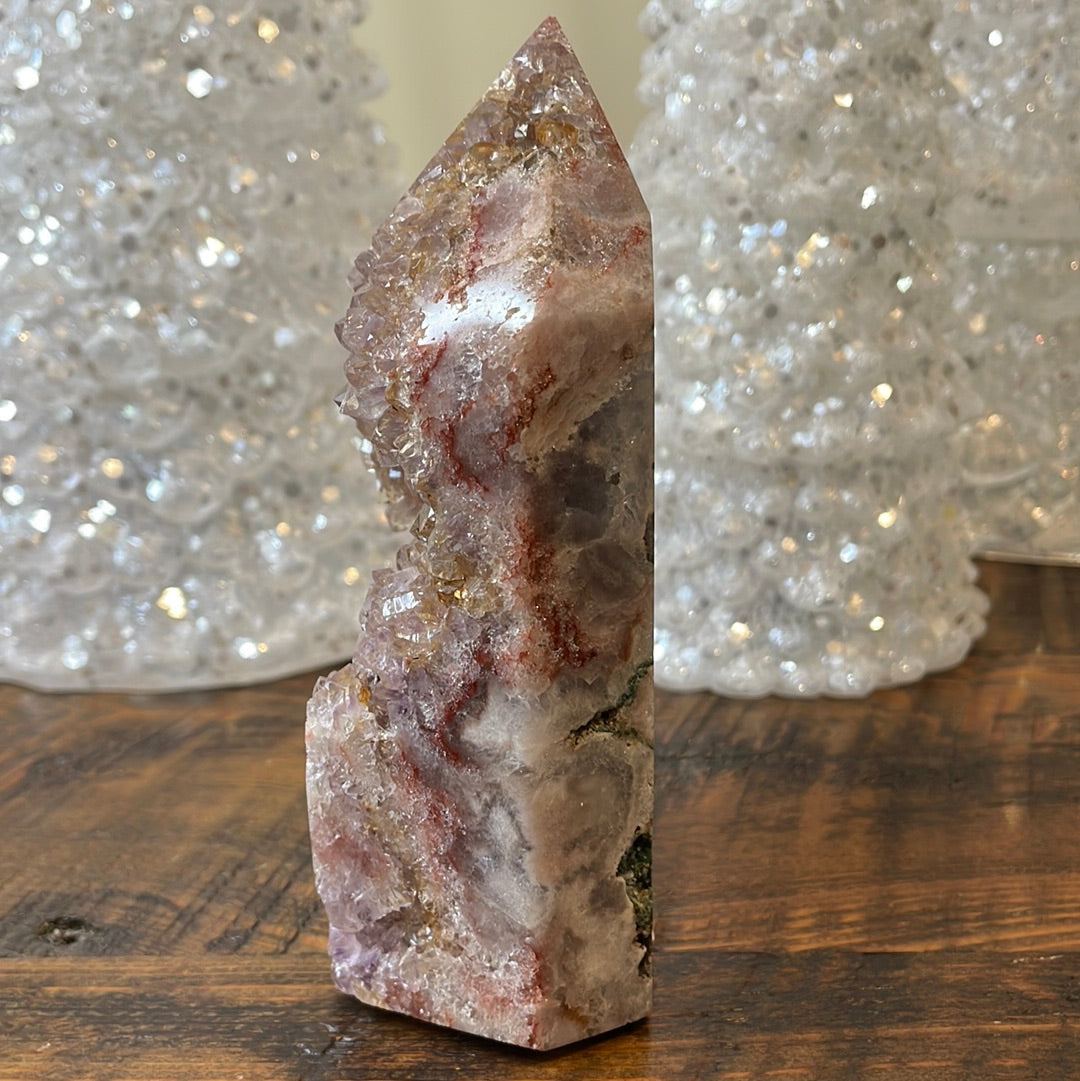 Pink Amethyst druzy tower, showcasing delicate crystalline formations in a soothing hue for a truly enchanting natural beauty.