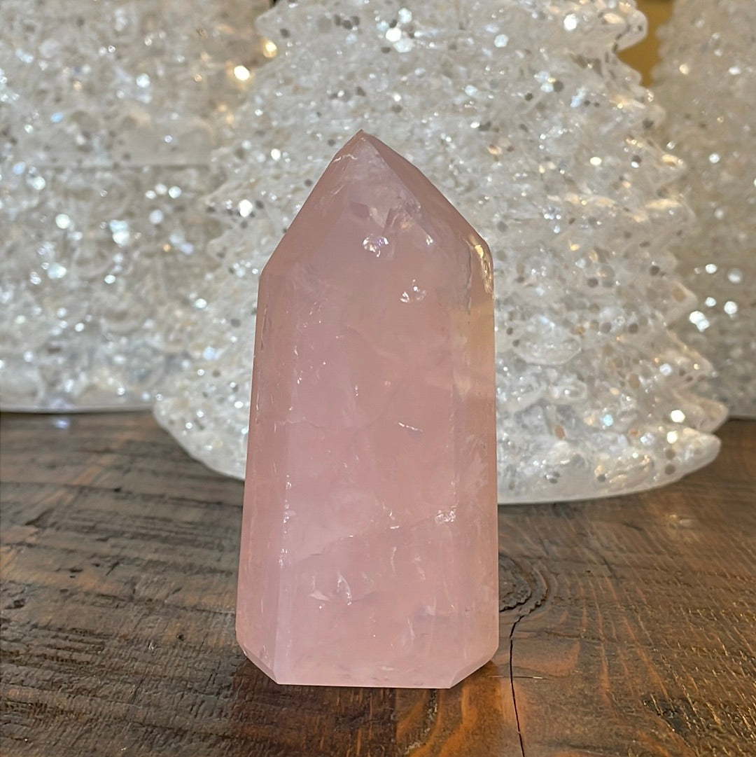 Elegant Rose Quartz tower, featuring soft pink tones and a graceful crystal formation for a serene and enchanting aesthetic
