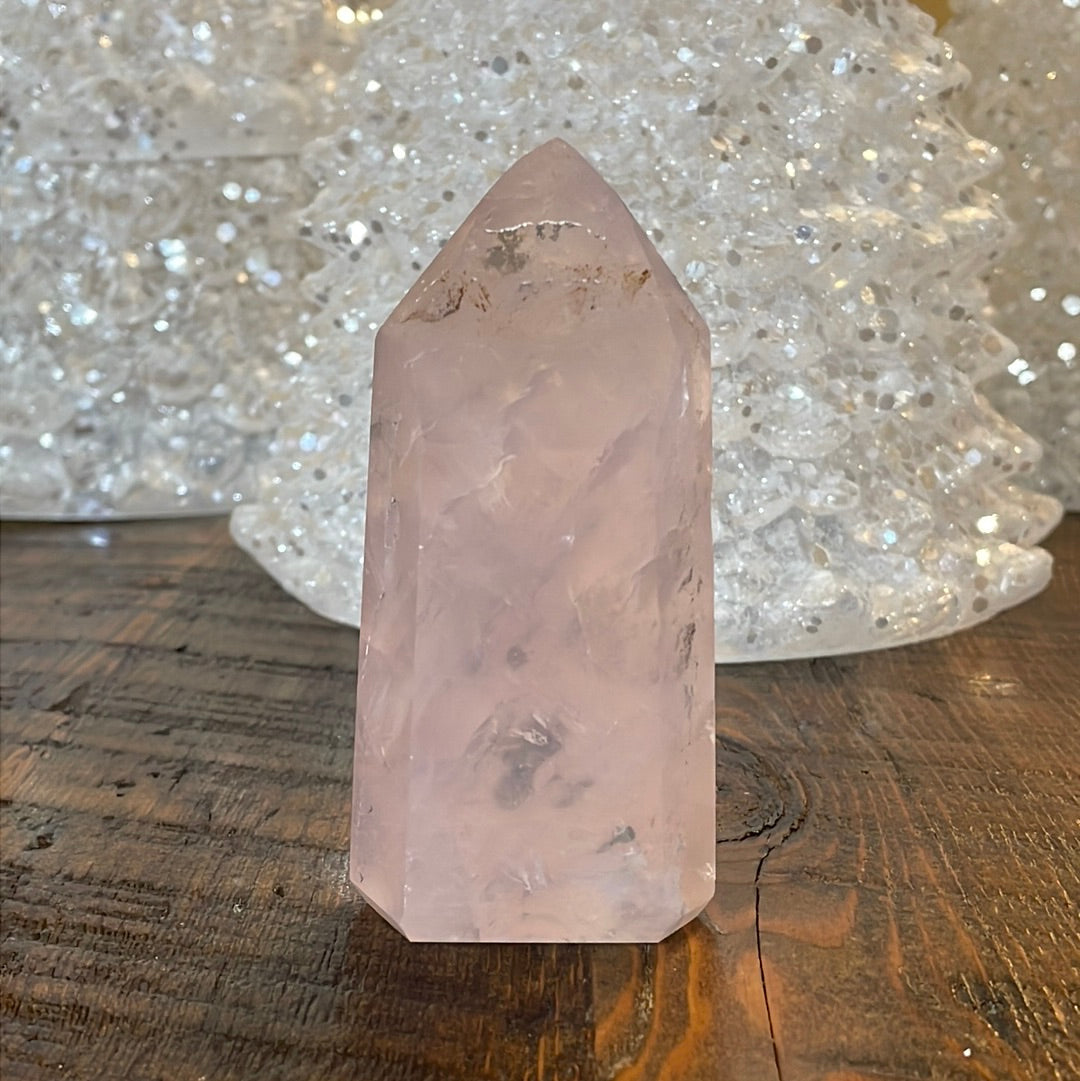 Elegant Rose Quartz tower, featuring soft pink tones and a graceful crystal formation for a serene and enchanting aesthetic