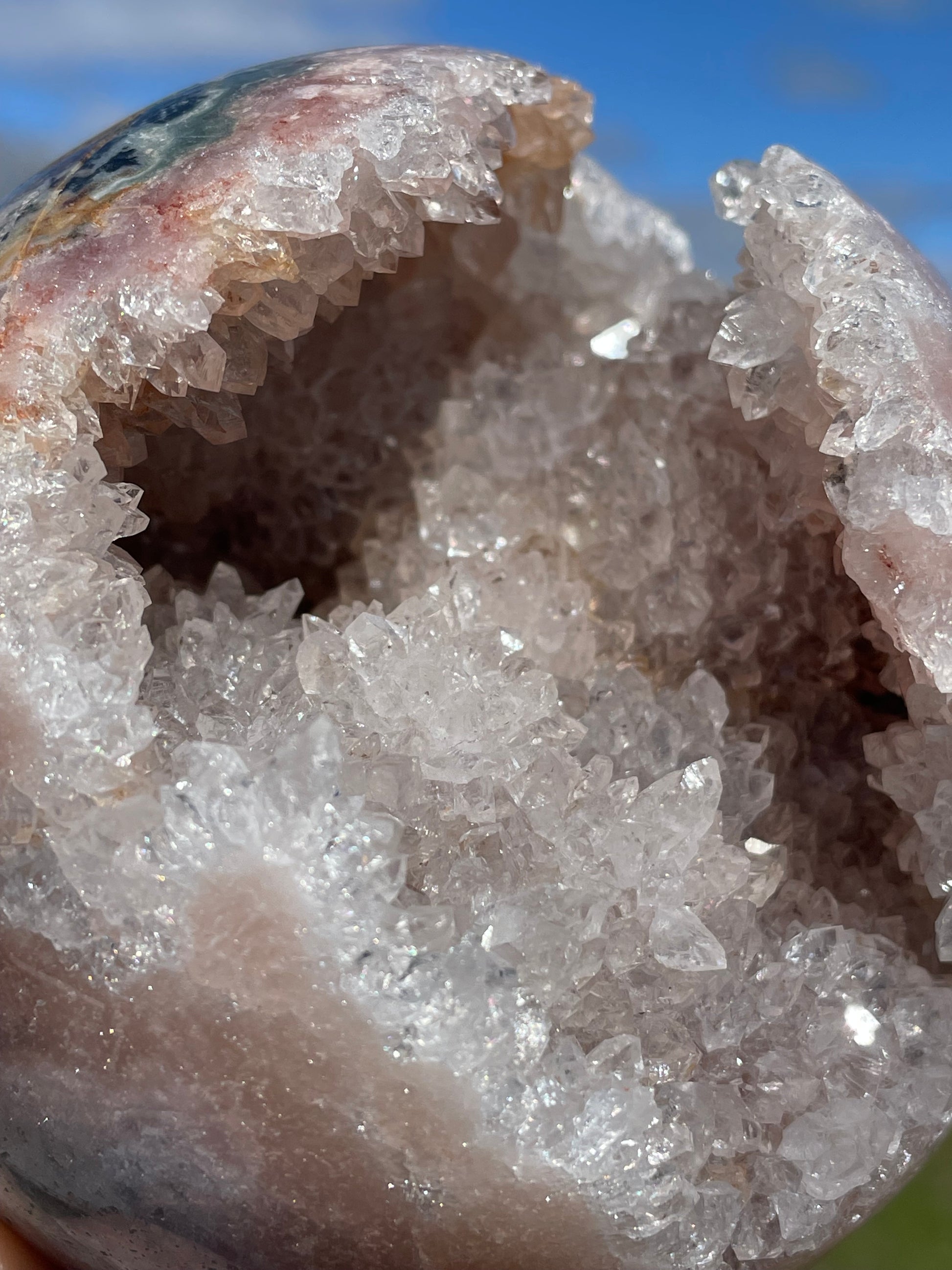 Pink Amethyst Sphere: Radiant crystal ball with delicate pink tones