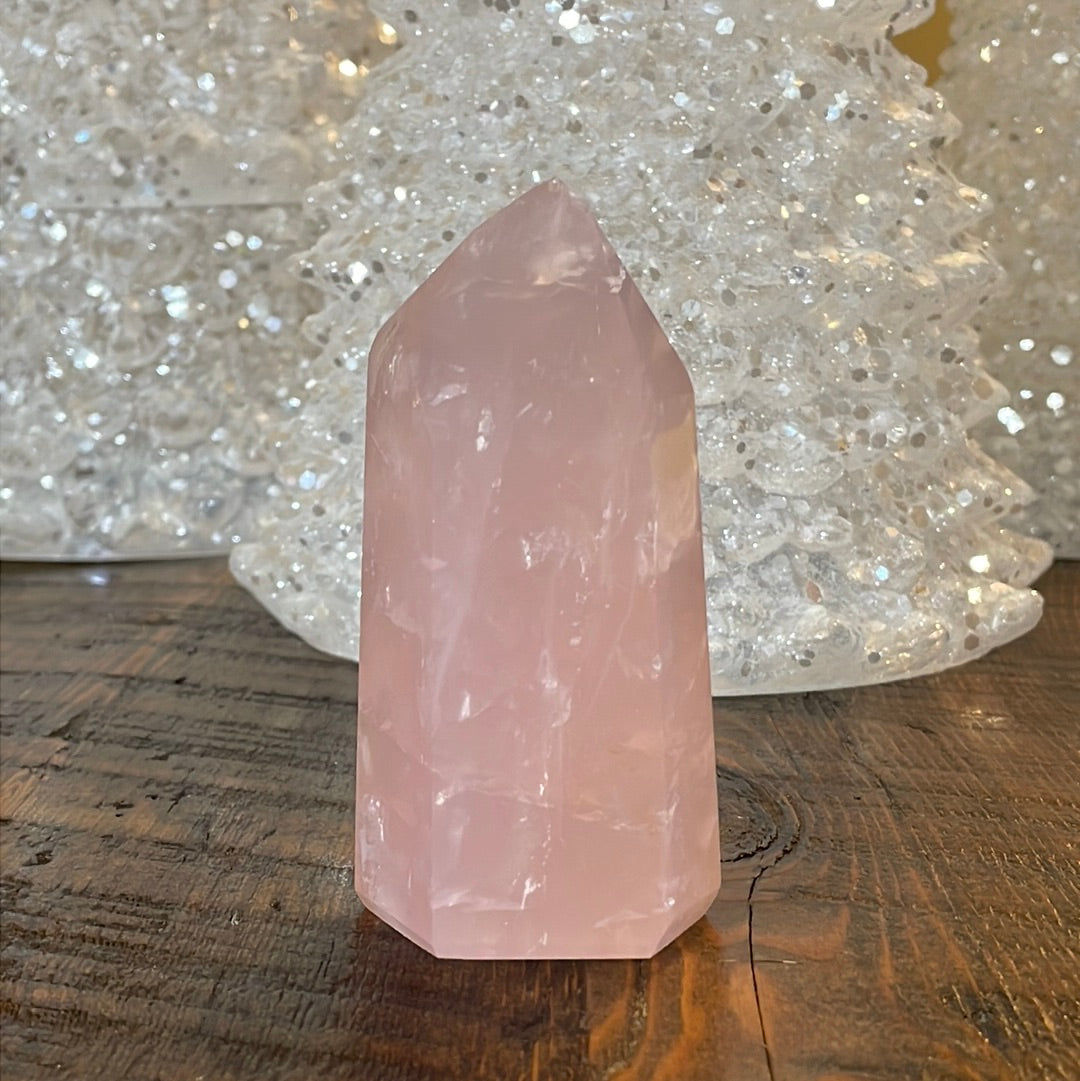 Elegant Rose Quartz tower, featuring soft pink tones and a graceful crystal formation for a serene and enchanting aesthetic