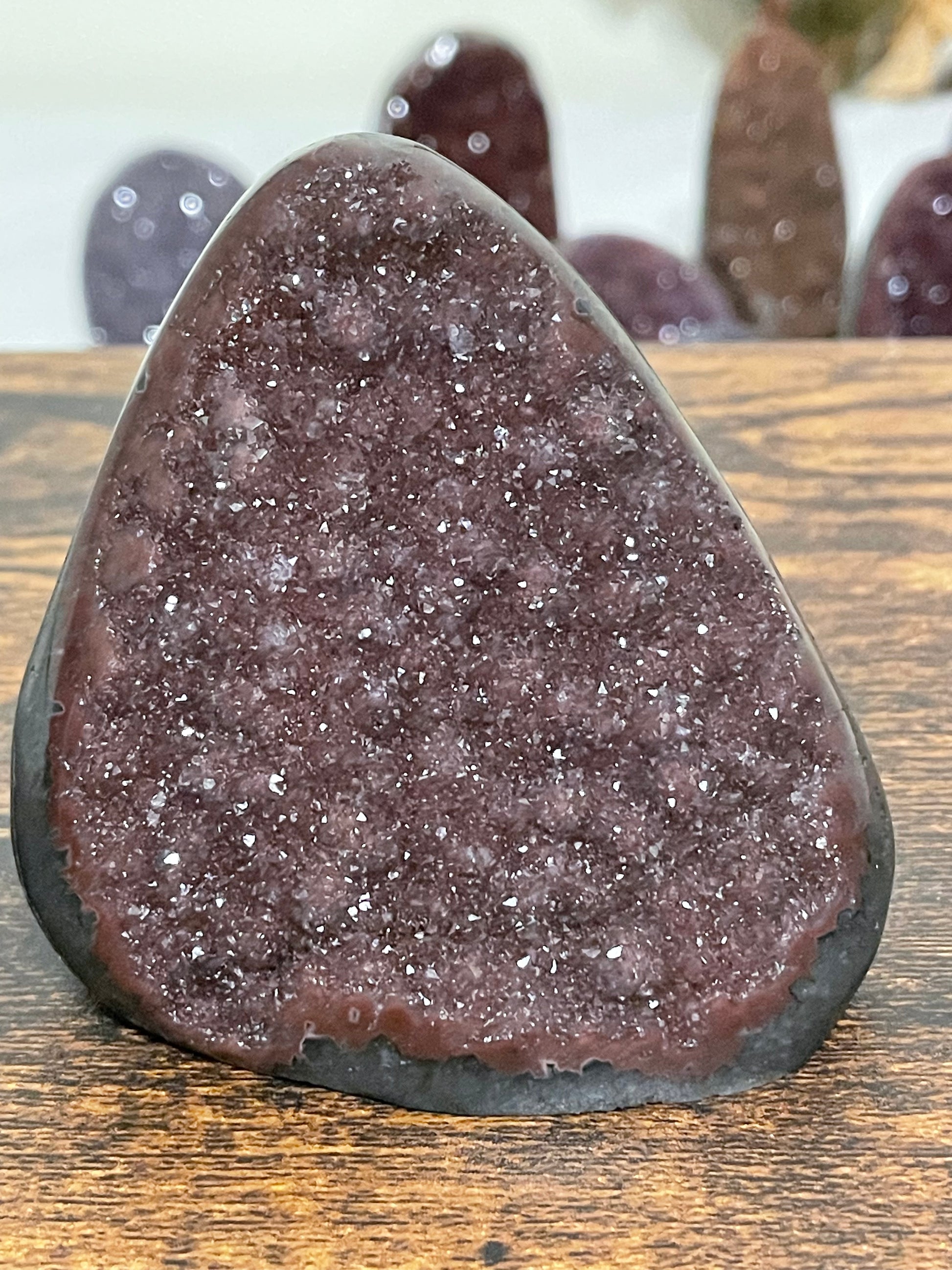 Variants of purple and grey Amethyst with flat base and sugar crystal cut, creating a distinctive and elegant crystal formation
