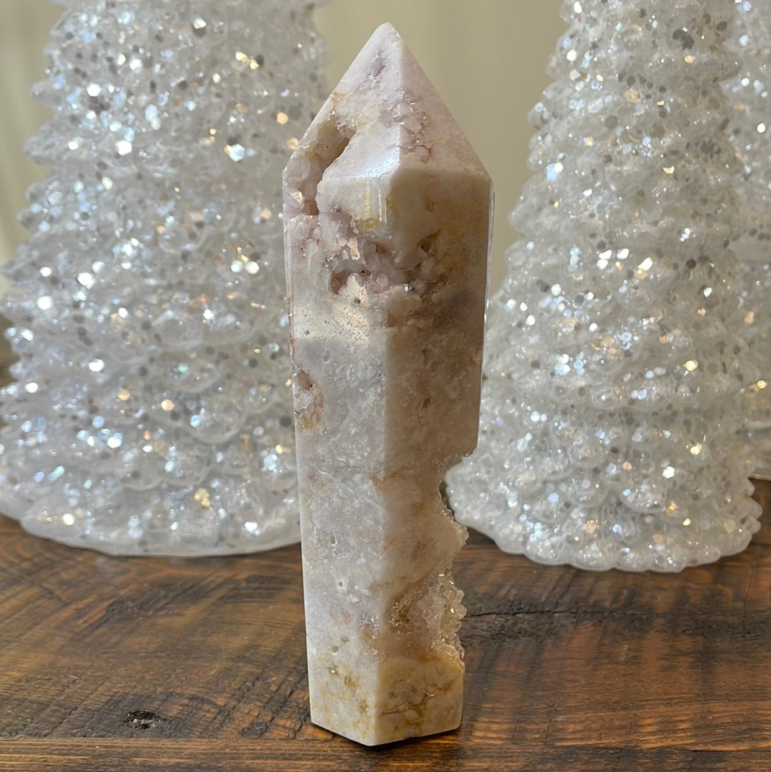 Pink Amethyst druzy tower, showcasing delicate crystalline formations in a soothing hue for a truly enchanting natural beauty.