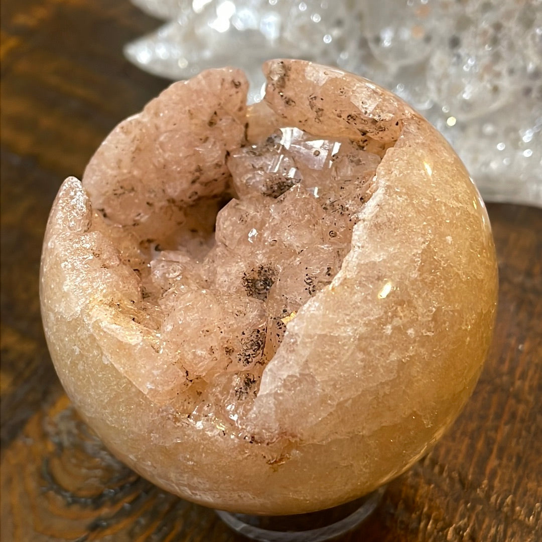 Pink Amethyst Druzy Sphere, a radiant and enchanting crystal ball showcasing delicate crystalline formations in soothing pink tones.