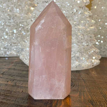 Elegant Rose Quartz tower, featuring soft pink tones and a graceful crystal formation for a serene and enchanting aesthetic