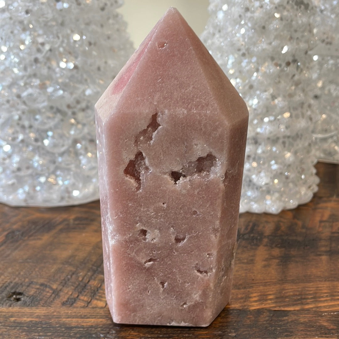 Pink Amethyst druzy tower, showcasing delicate crystalline formations in a soothing hue for a truly enchanting natural beauty.
