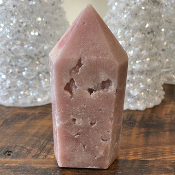Pink Amethyst druzy tower, showcasing delicate crystalline formations in a soothing hue for a truly enchanting natural beauty.