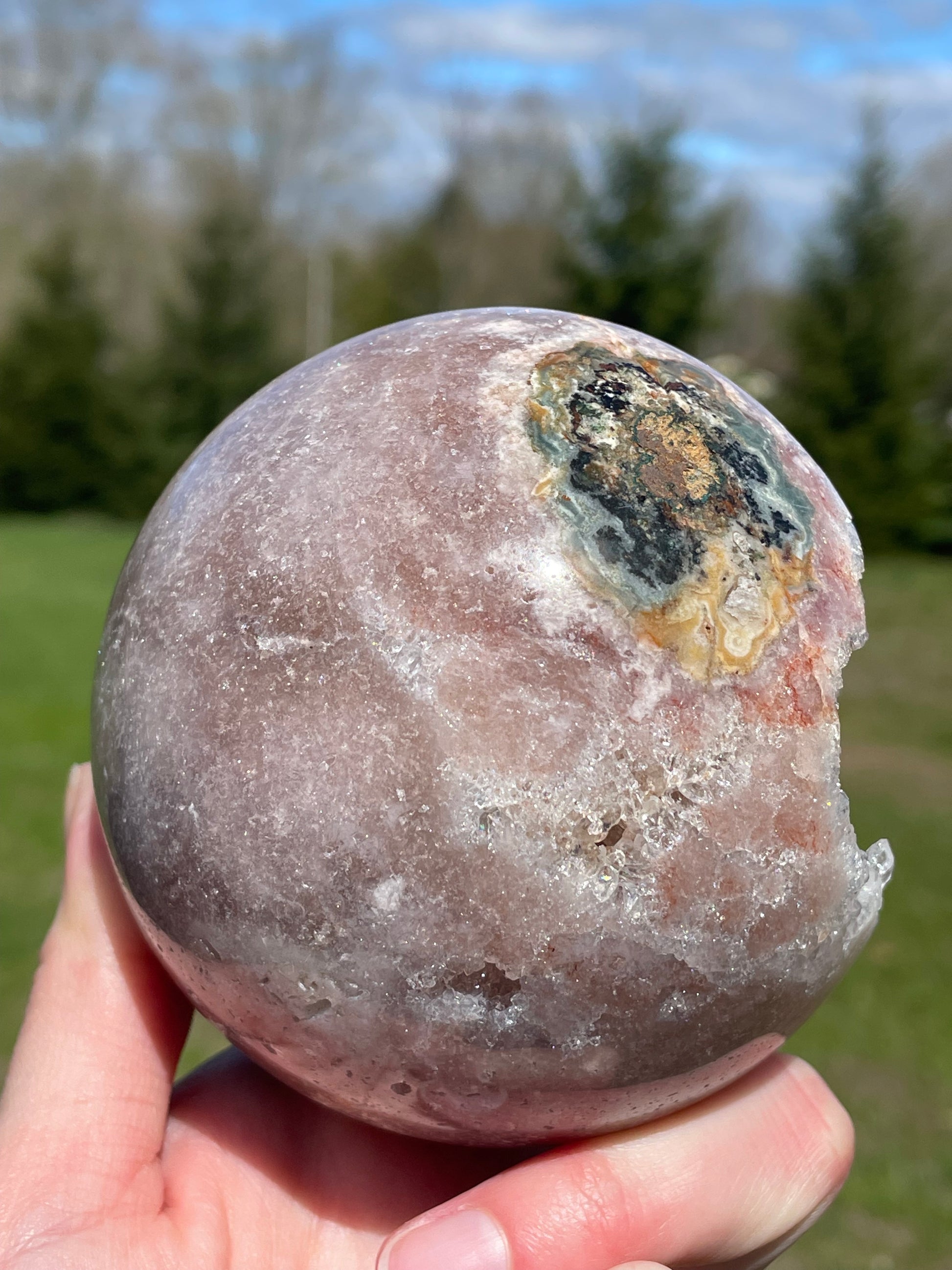 Pink Amethyst Sphere: Radiant crystal ball with delicate pink tones