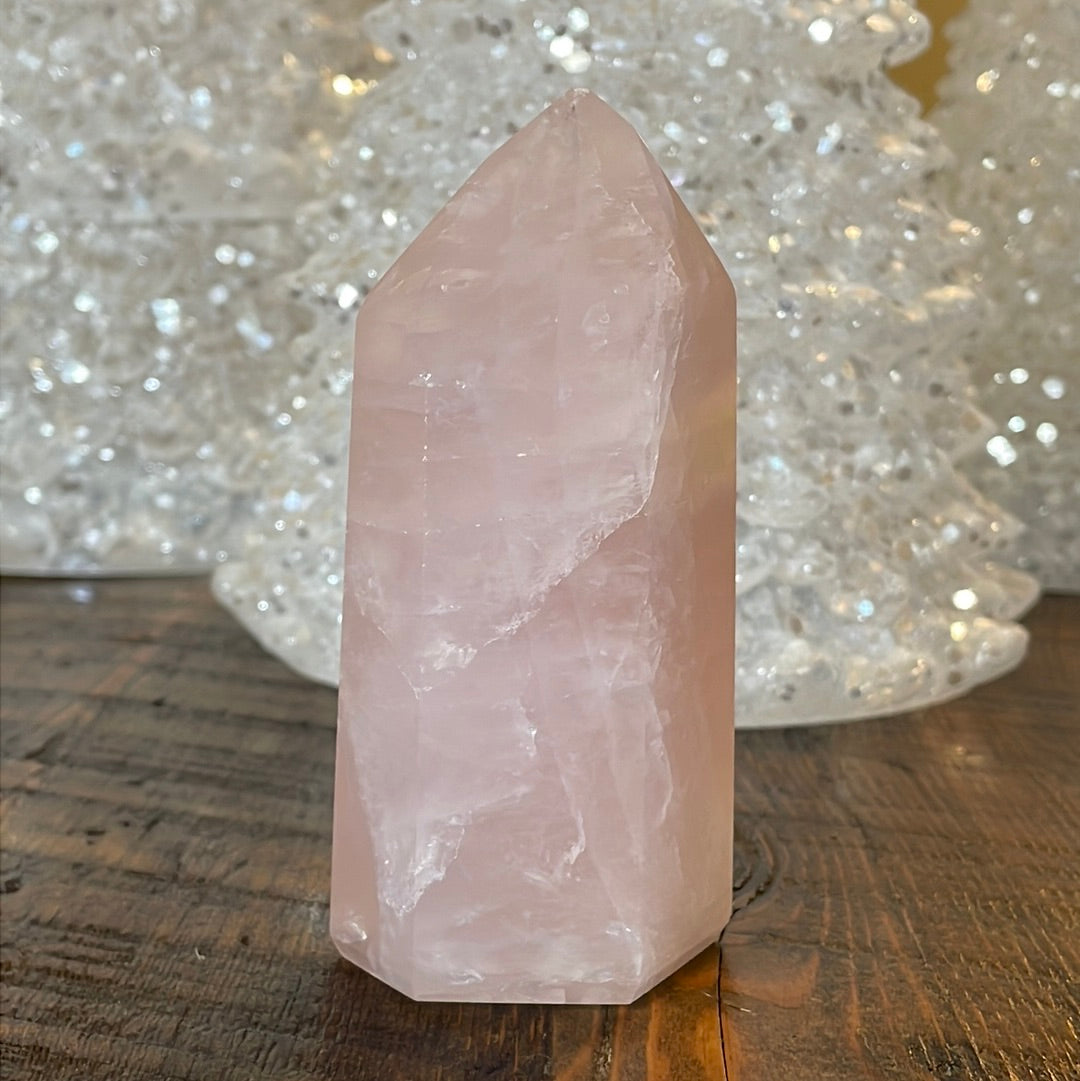 Elegant Rose Quartz tower, featuring soft pink tones and a graceful crystal formation for a serene and enchanting aesthetic