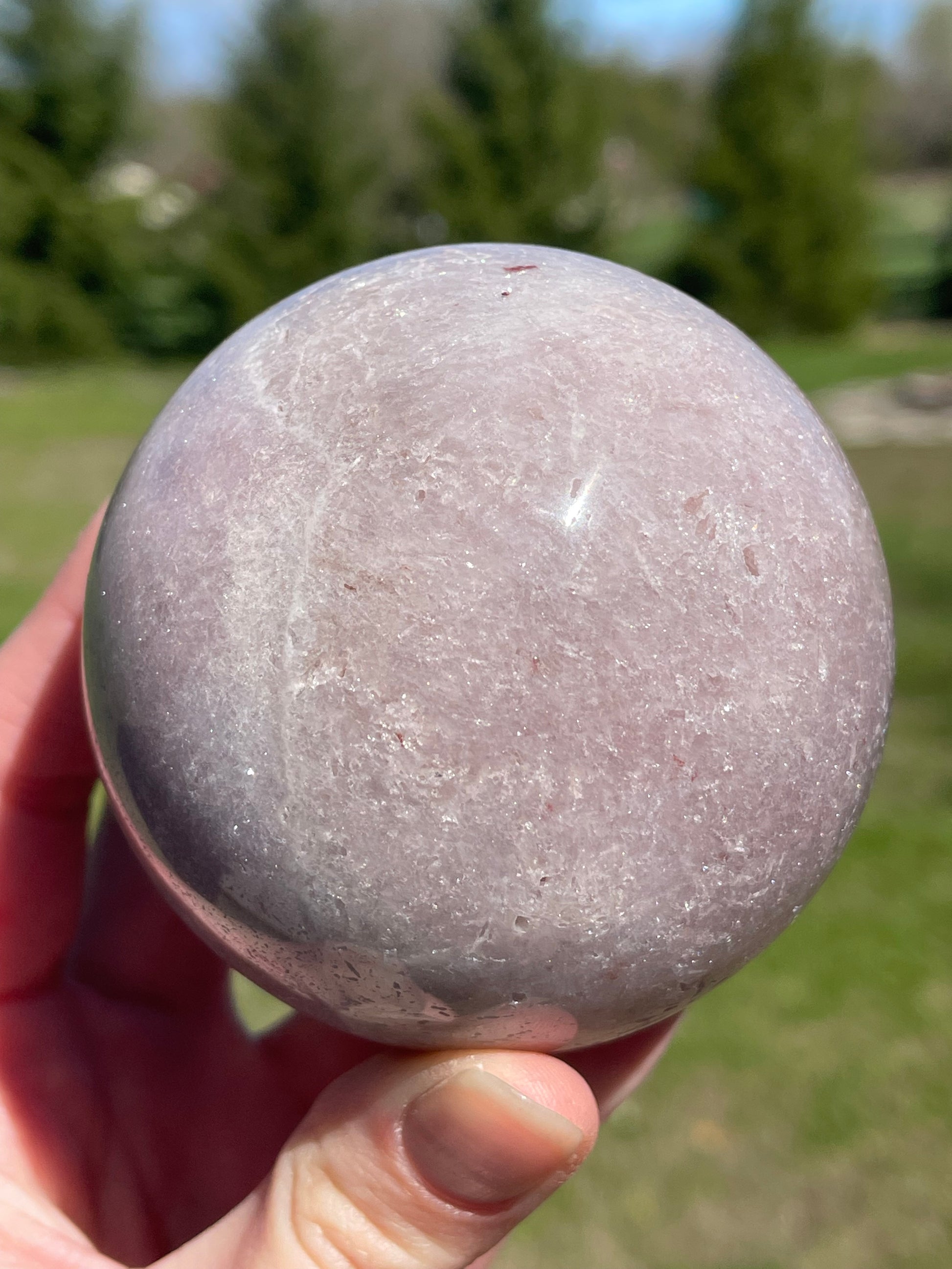 Pink Amethyst Sphere: Radiant crystal ball with delicate pink tones