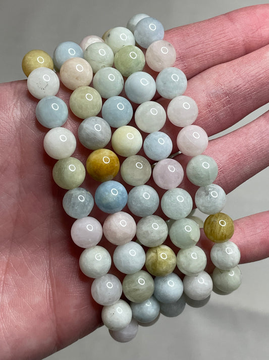 Pink Morganite bracelet adorned with 8mm beads, showcasing the delicate and soothing hues of pink morganite crystals. This bracelet combines elegance with a touch of serenity, making it a charming accessory for any occasion.