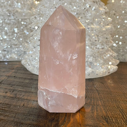 Elegant Rose Quartz tower, featuring soft pink tones and a graceful crystal formation for a serene and enchanting aesthetic
