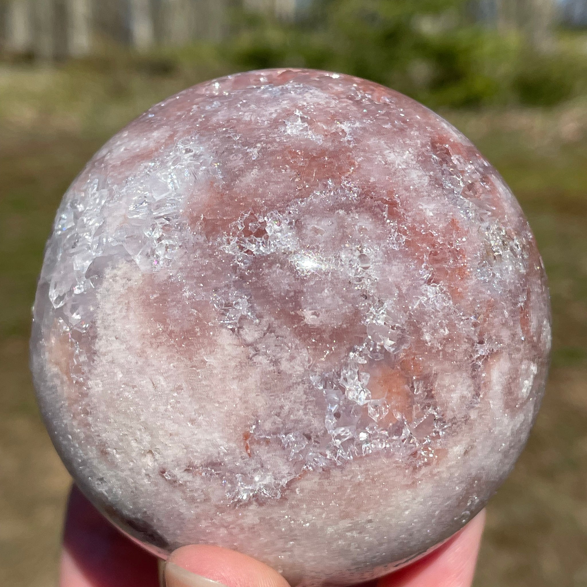 Pink Amethyst Sphere: Radiant crystal ball with delicate pink tones