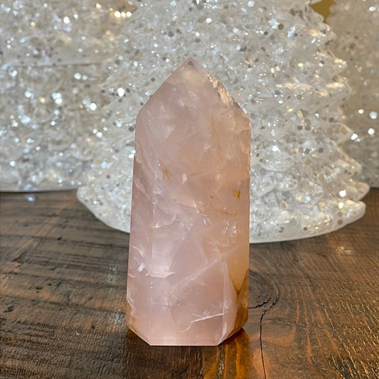 Elegant Rose Quartz tower, featuring soft pink tones with golden healer and a graceful crystal formation for a serene and enchanting aesthetic