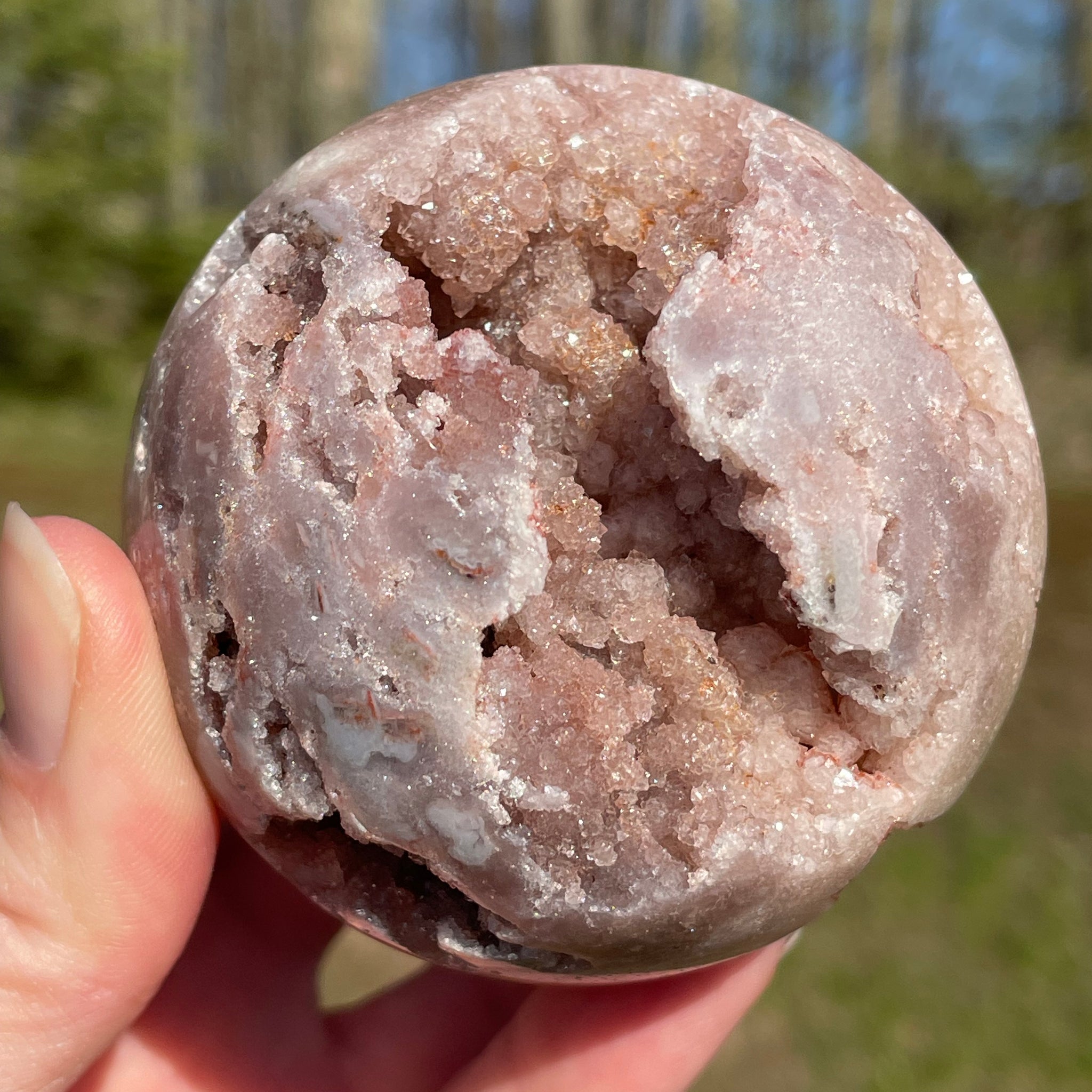 Pink Amethyst Sphere: Radiant crystal ball with delicate pink tones