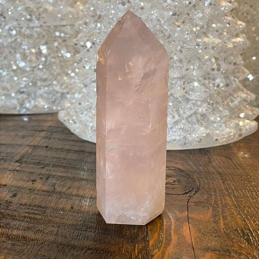Elegant Rose Quartz tower, featuring soft pink tones and a graceful crystal formation for a serene and enchanting aesthetic